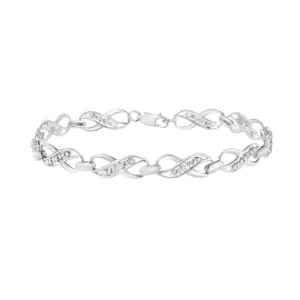 .925 Sterling Silver Prong Set Diamond Accent Ribbon and Infinity Link Bracelet (I-J Color, I3 Clarity) - 7.25"
