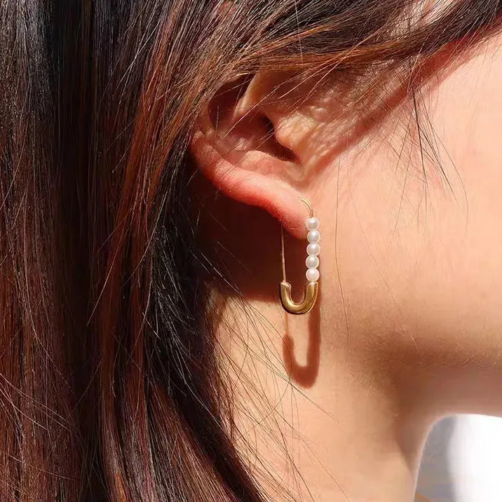 Gold Pearl Dangling Earrings