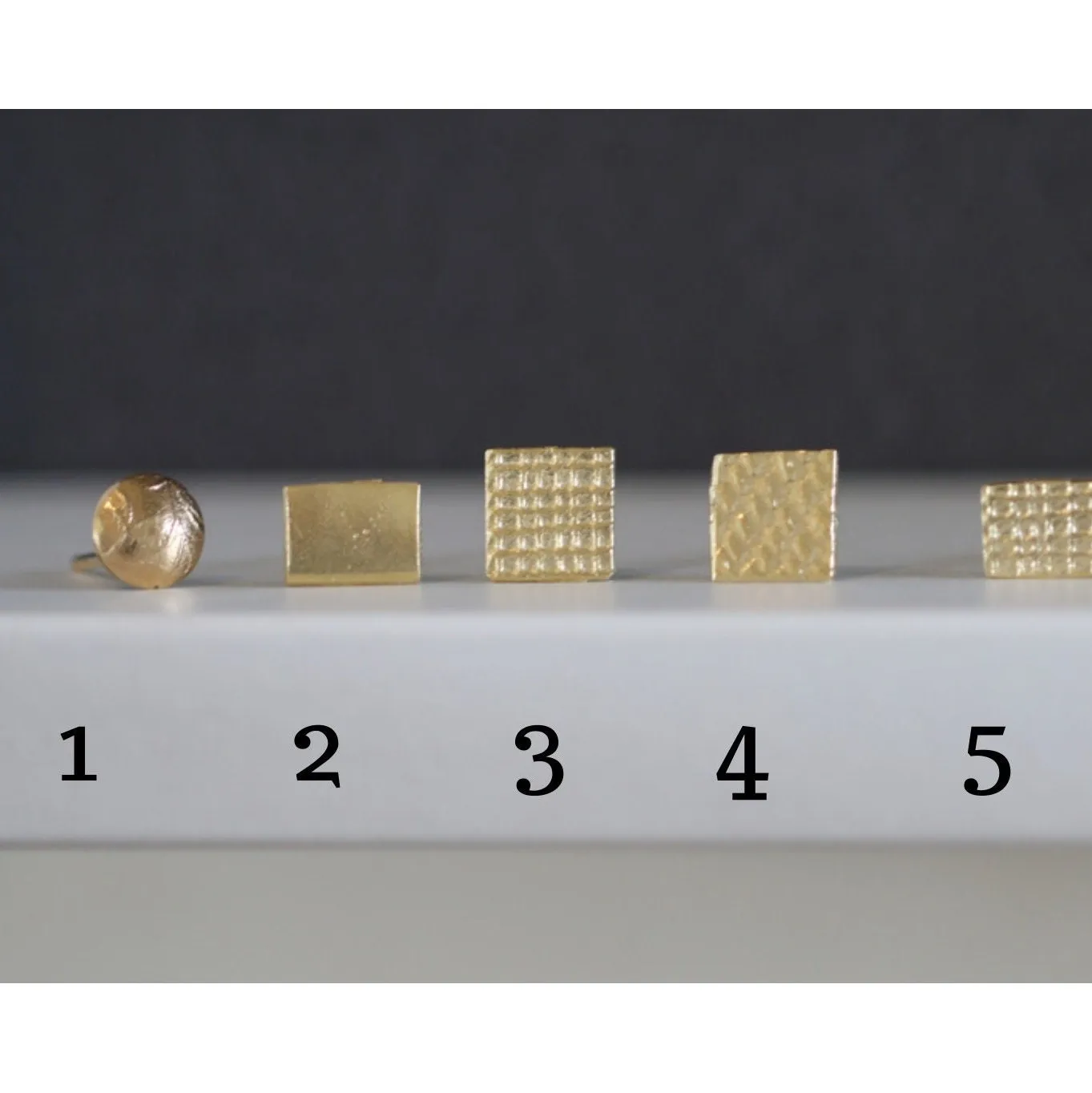 Unique gold stud earrings